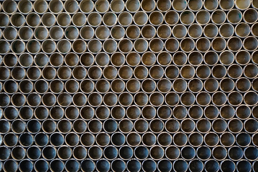 a bunch of pipes that are stacked together