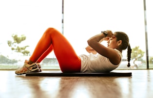 woman exercising indoors