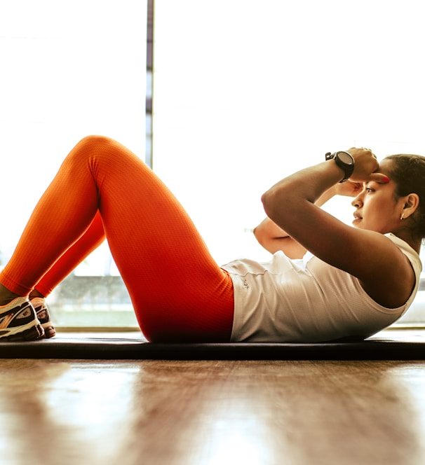 woman exercising indoors