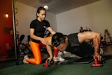 Personal trainer coaching session