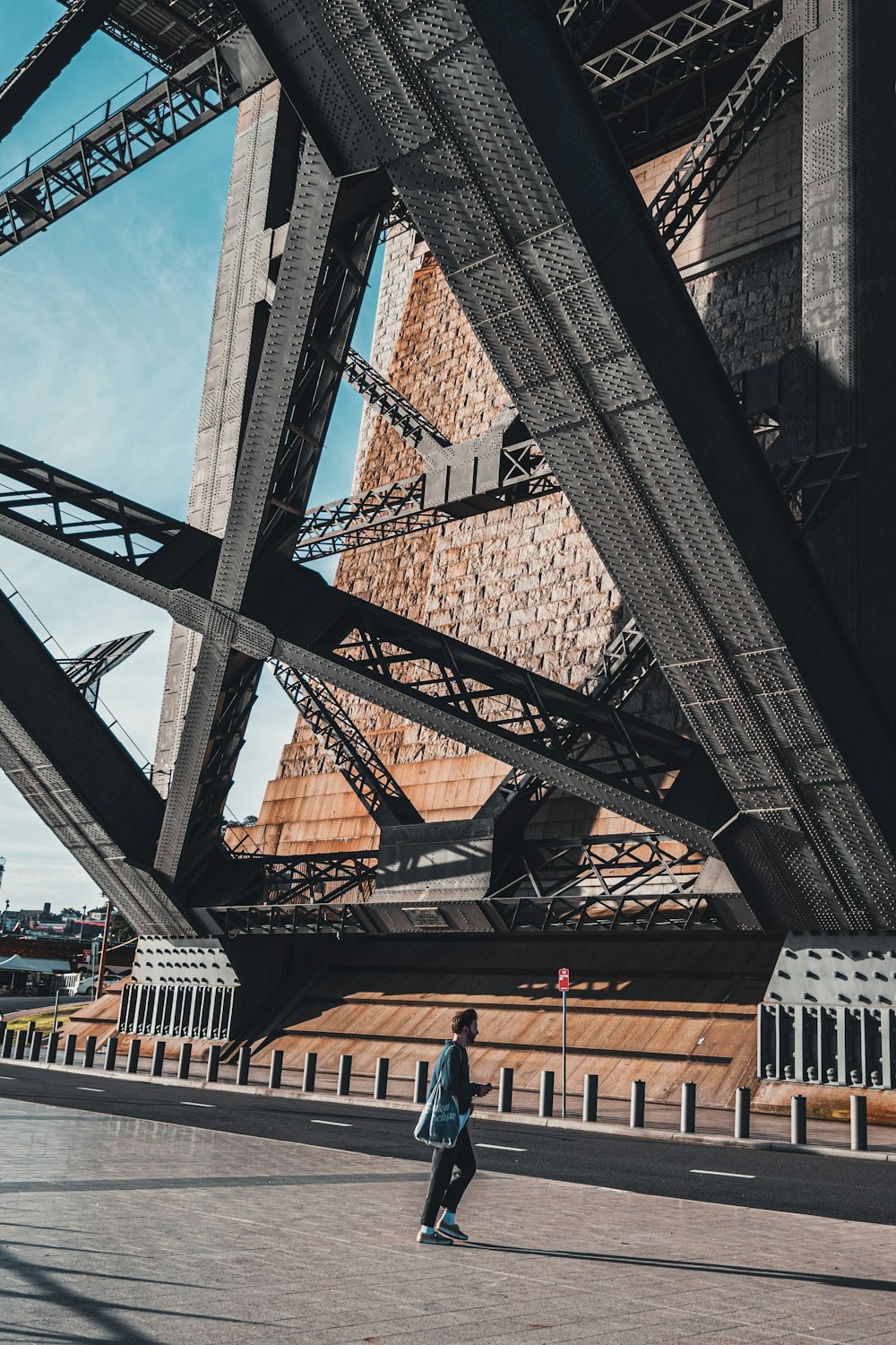 person standing in front of bridge