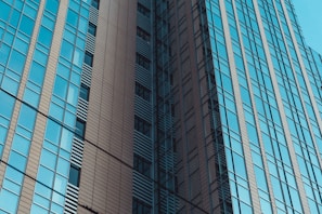 Finished modern building with clean lines and glass windows.