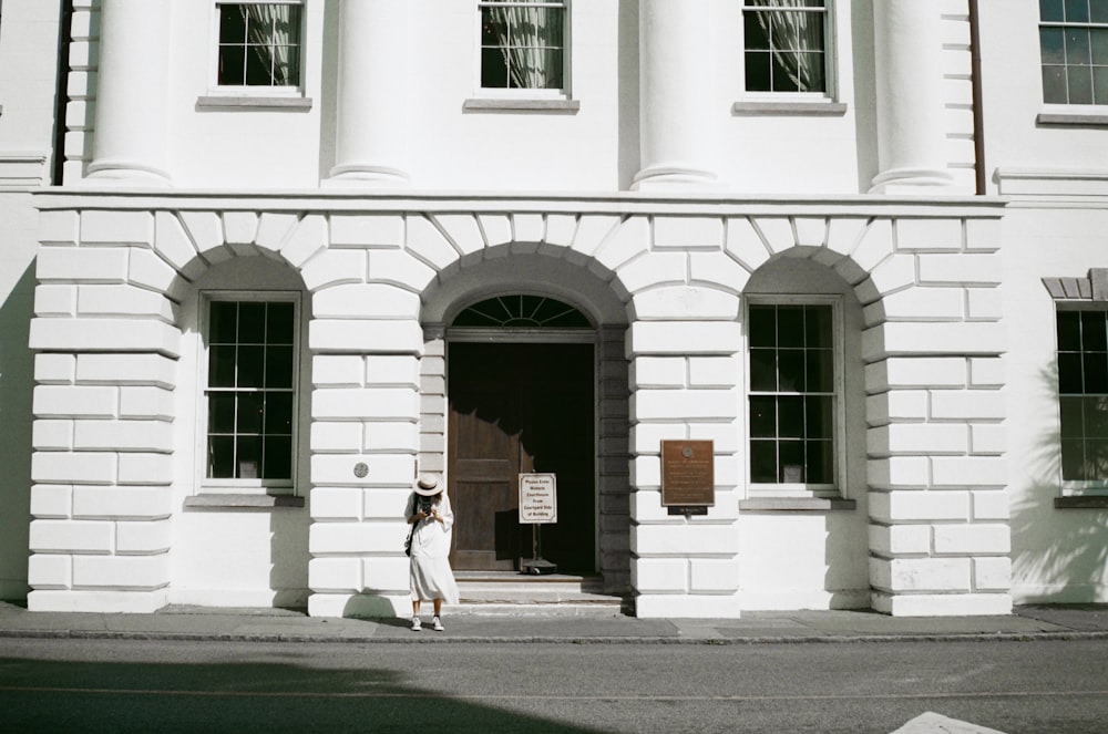 woman standing outside building