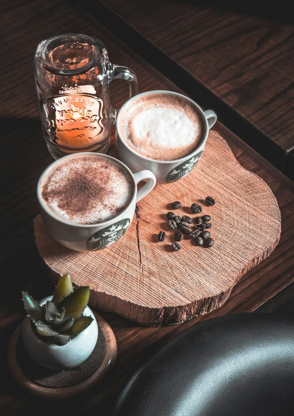 two white cups filled with coffee