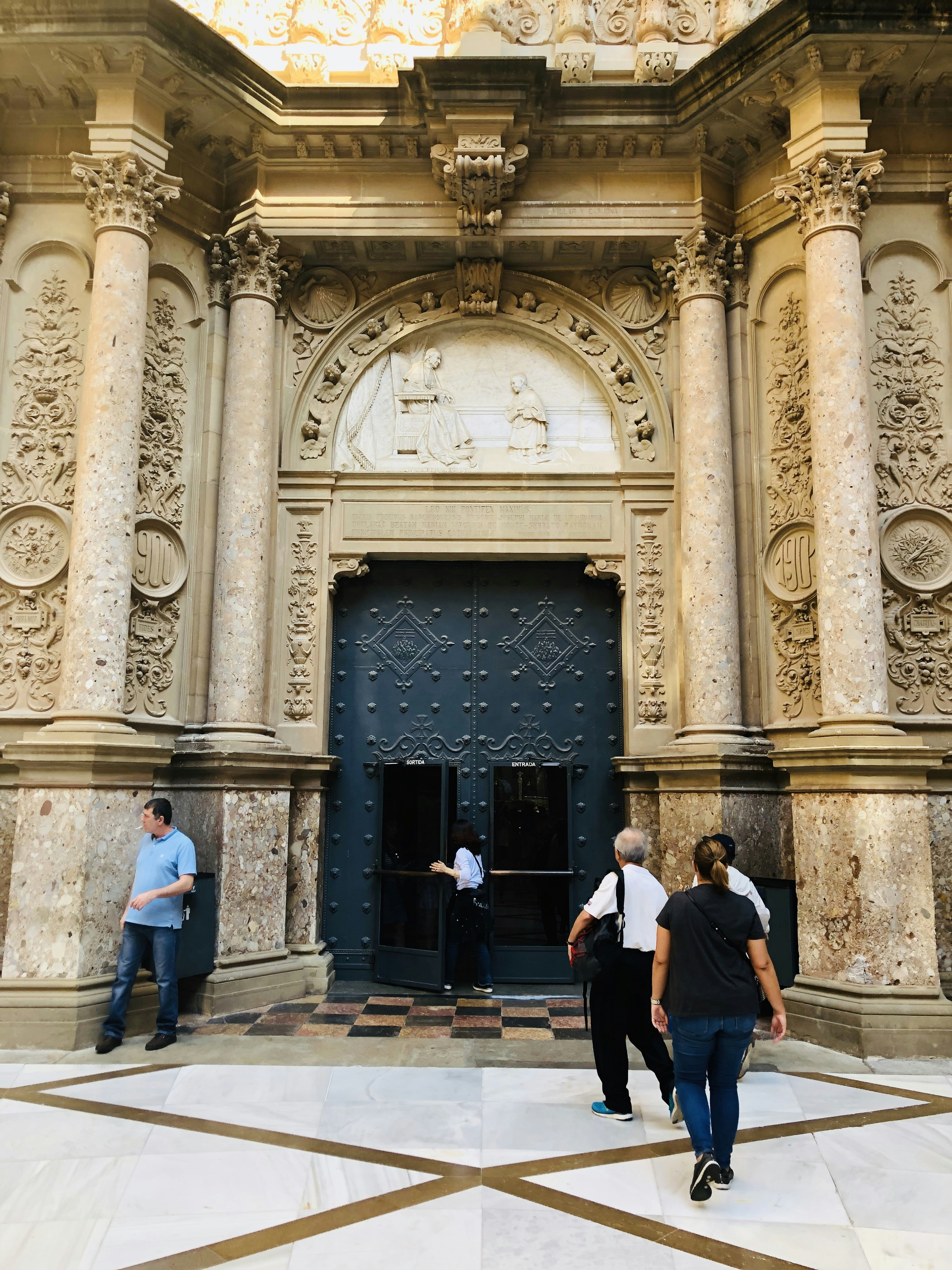 people standing near door