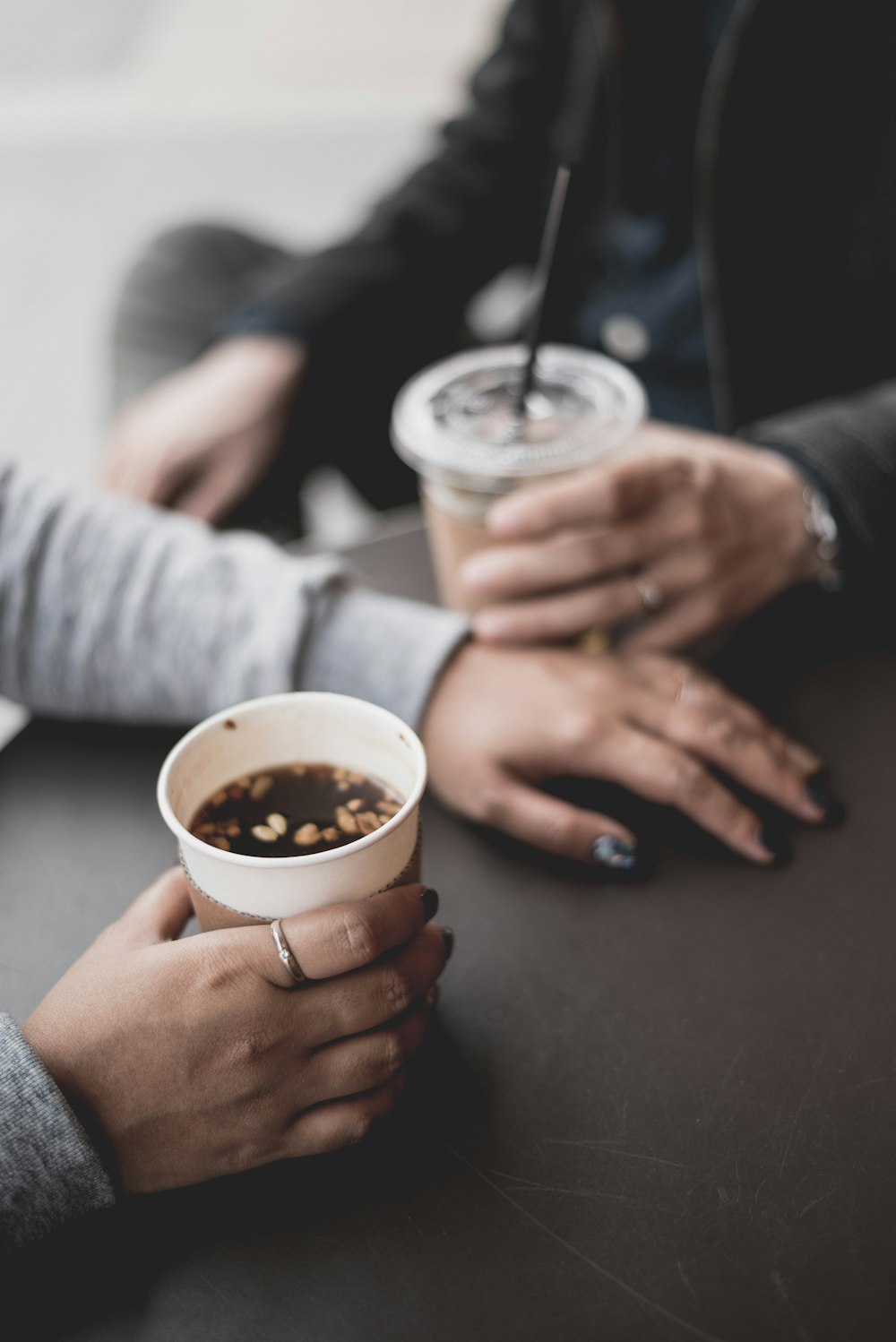 person holding cup