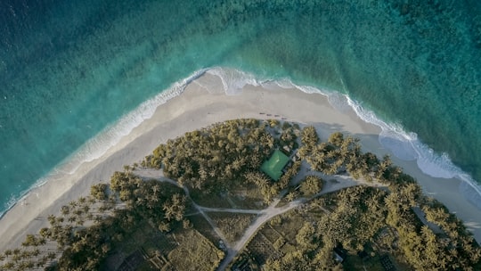 aerial photography of white sand beach in Fuvahmulah Maldives