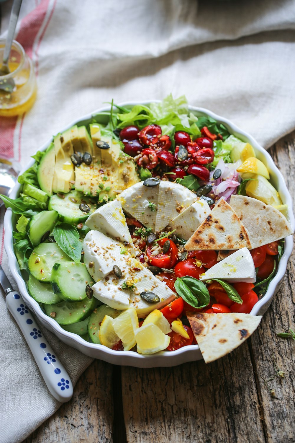 sliced vegetables in white ceramic bowl