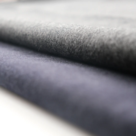 Close-up of durable industrial fabric rolls in a workshop setting