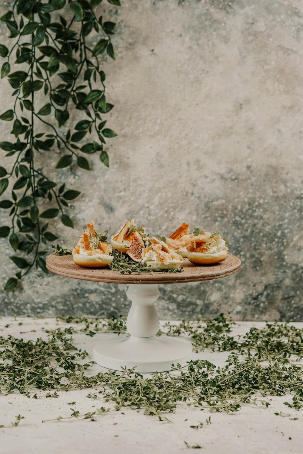 bun with vegetables on top of wooden tray