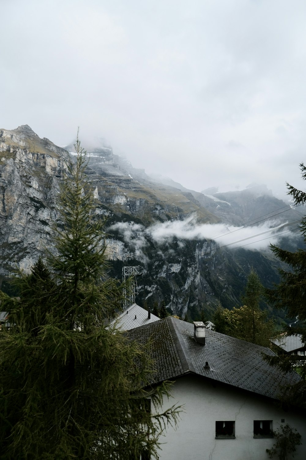 view of house near mountain at daytime