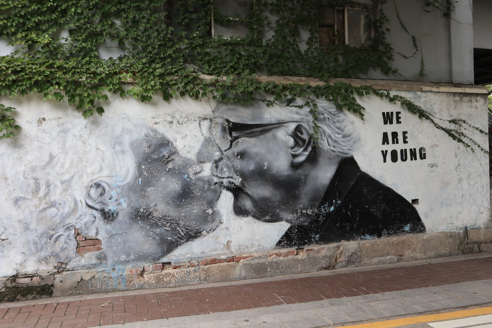 kissing man and woman wall art