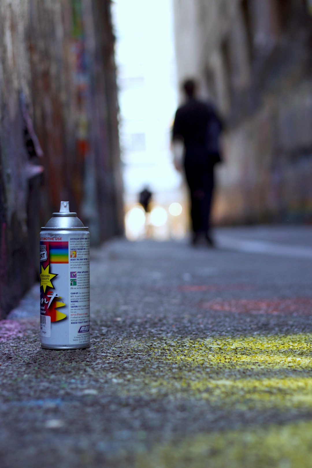 white and multicolored spray bottle