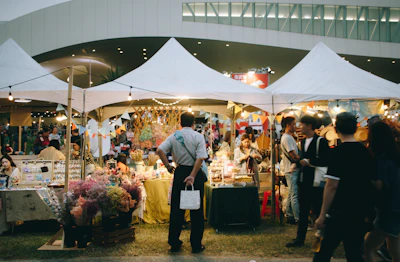 A vibrant handmade market stall displaying colourful crafted goods