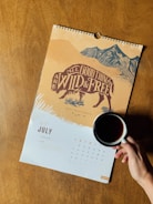 yellow and white July calendar