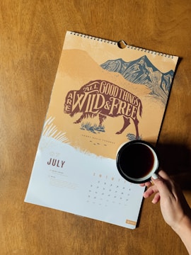 yellow and white July calendar