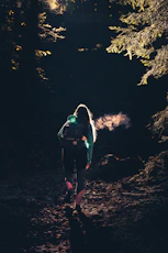 standing woman wearing blue dress shirt