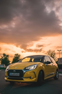 yellow 3-door hatchback