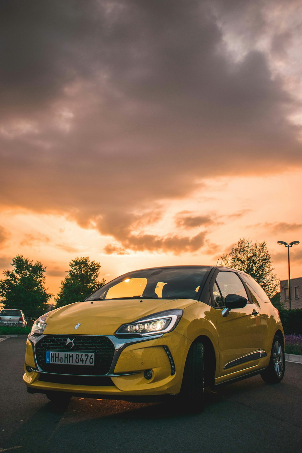 yellow 3-door hatchback