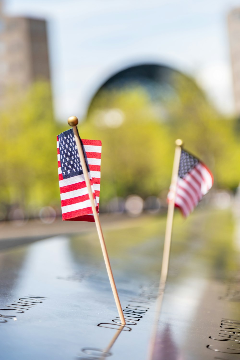 two USA flaglets during daytime