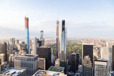 A panoramic aerial view of Goga Heights Smart City Katampe, highlighting green spaces and modern architecture under a clear sky.