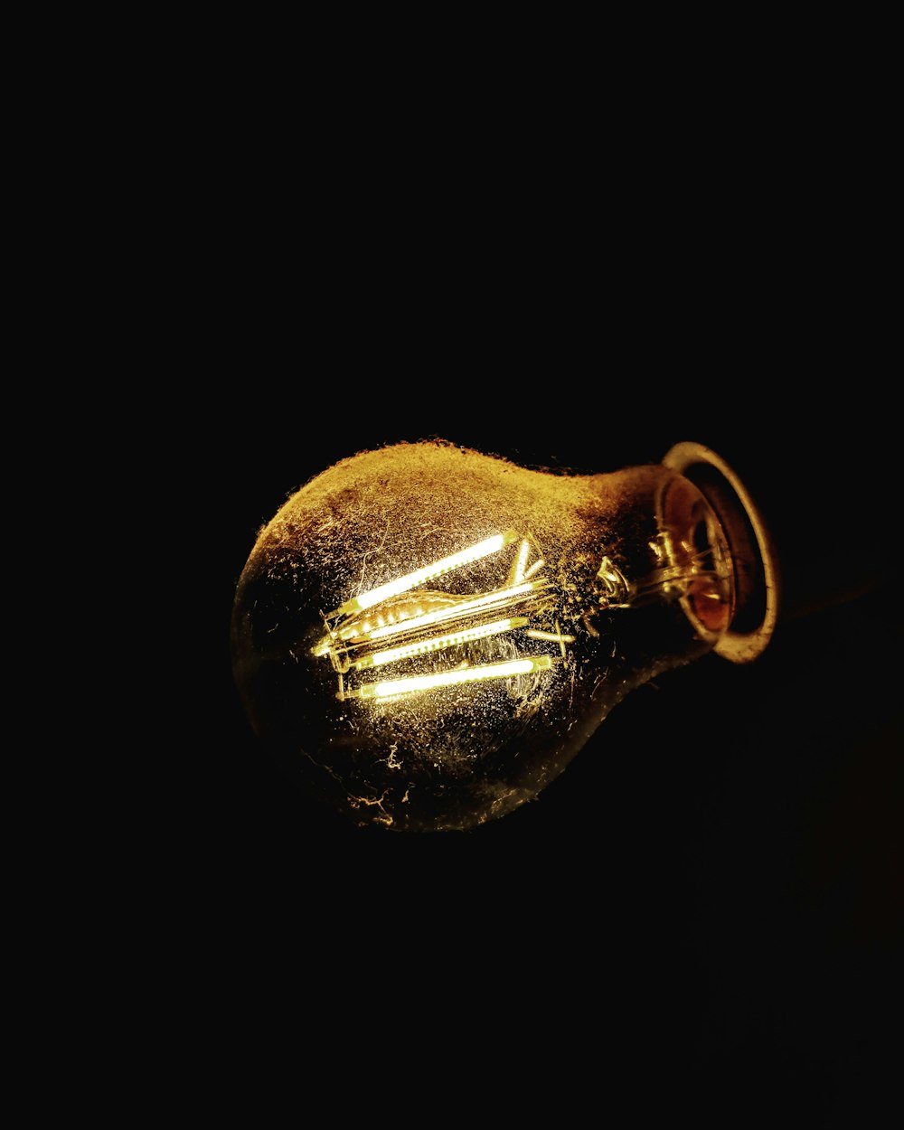a light bulb that is glowing in the dark