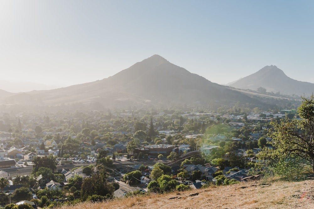 photo of mountain and city scenery