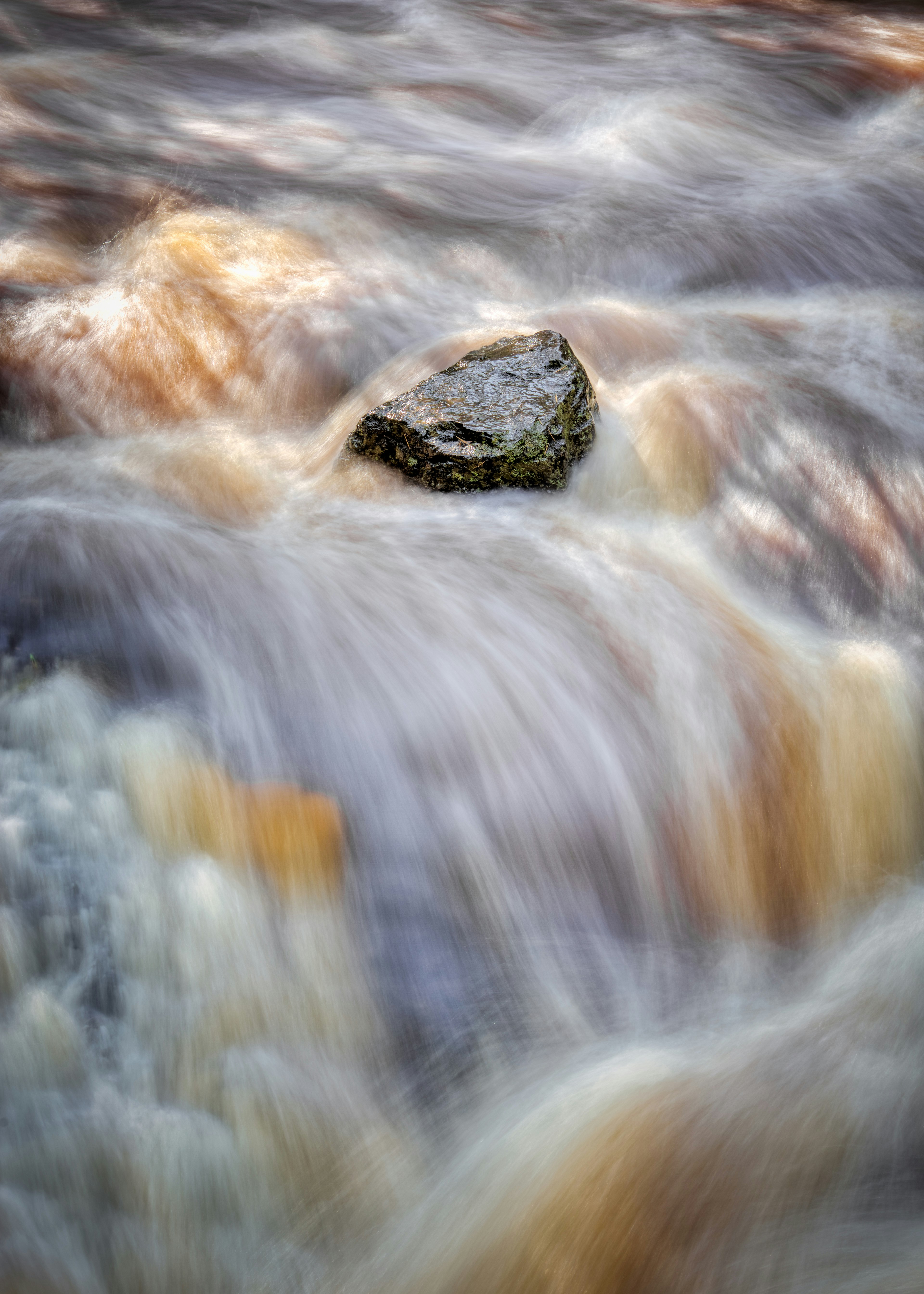 closeup photo of body of water in timelapse photo