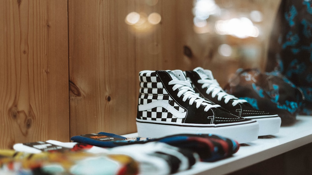 black-and-white Vans checked sneakers