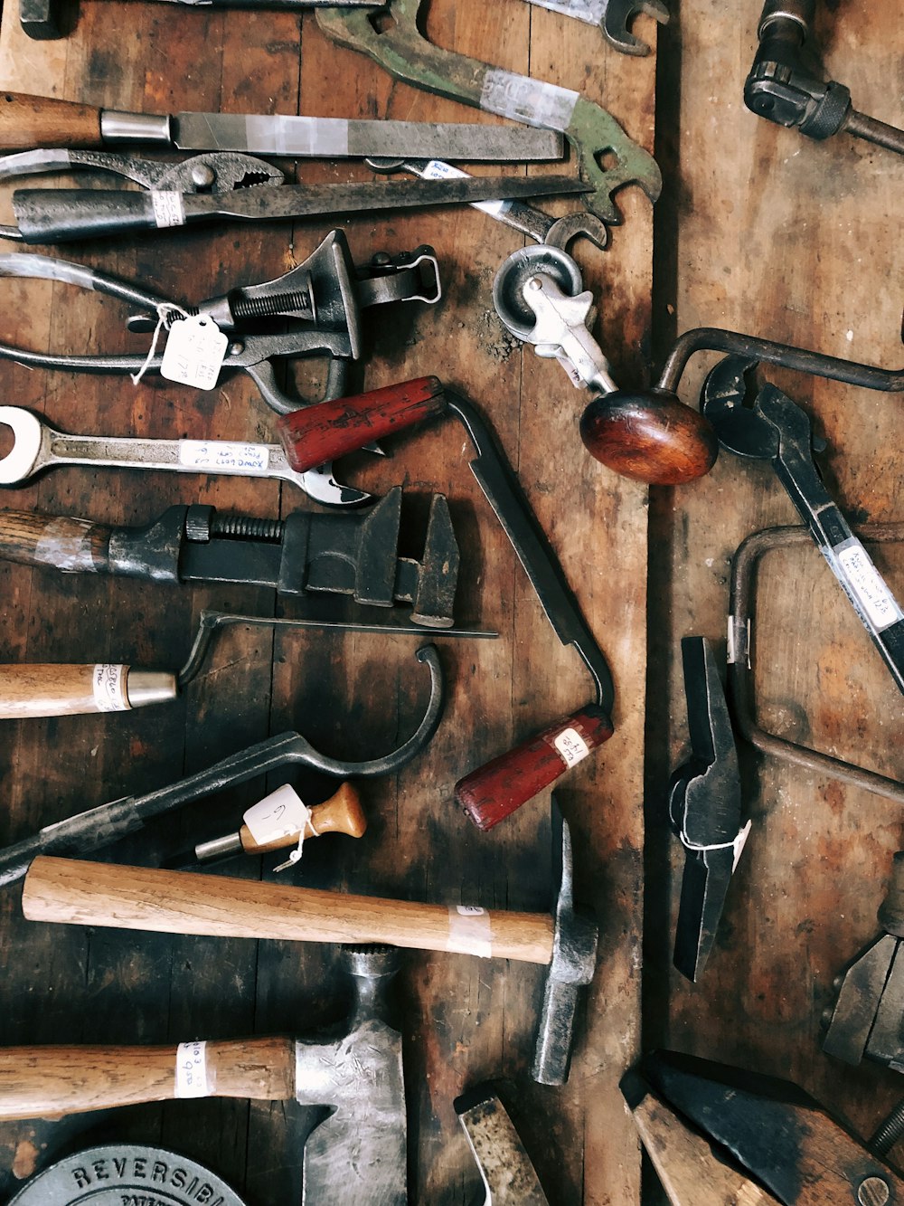 assorted-colored hand tools