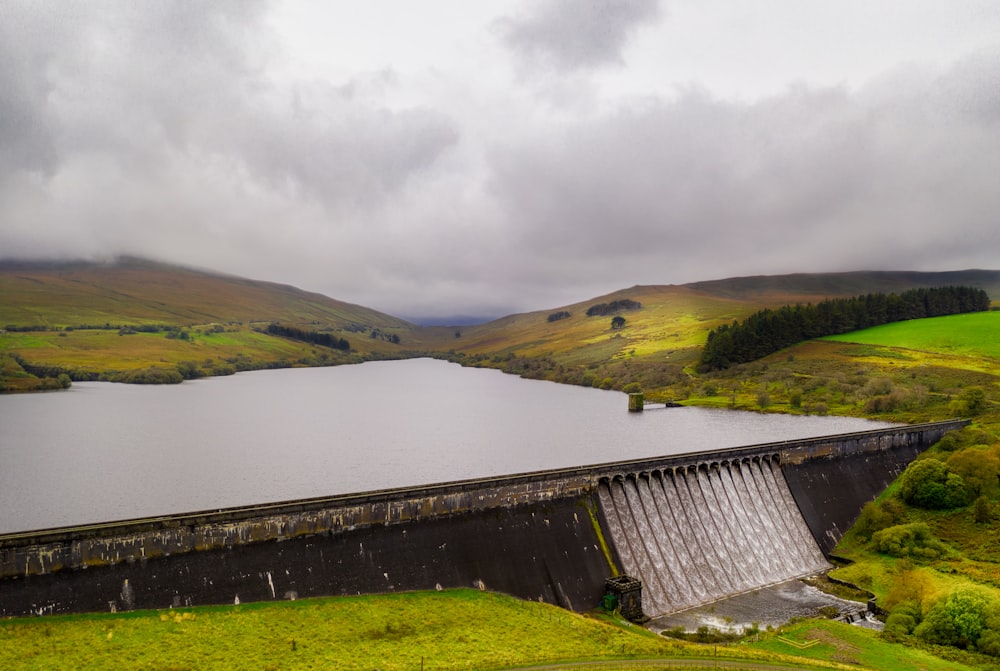 architectural photography of black water dam