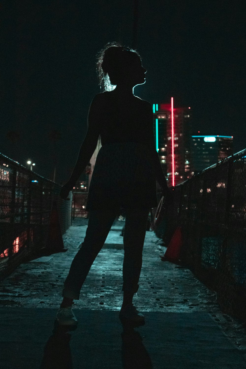 silhouette photography of standing woman