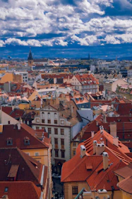 Aerial view of Ambato city with elegant homes inspired by castle designs.