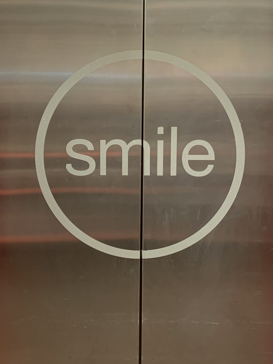 elevator door with Smile print