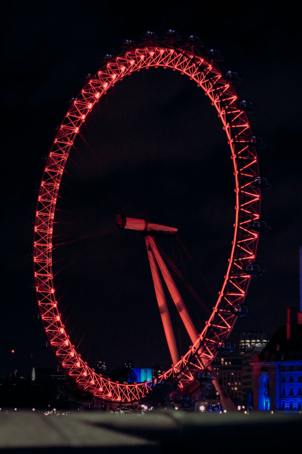 red Ferris wheel during nighttime