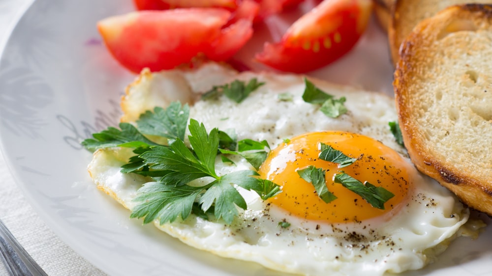 fried eggs with parsley