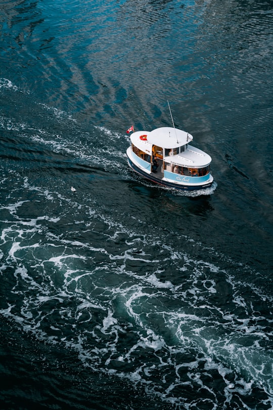 aerial photo of white boat in ocean during daytime in False Creek Canada