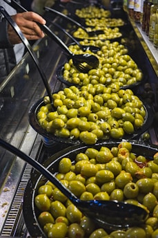 green fruits on black basins