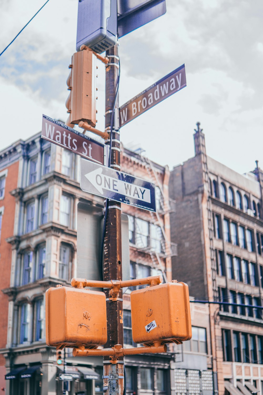 black and orange street signage