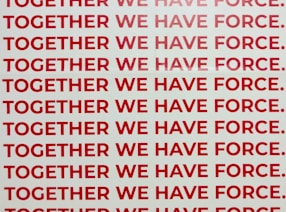 together we have force text overlay on white background