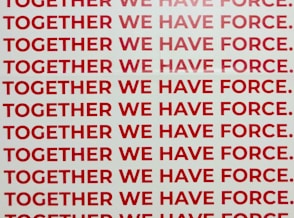 together we have force text overlay on white background