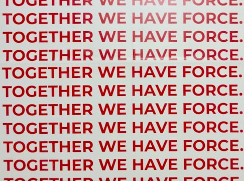 together we have force text overlay on white background