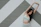 A focused woman stretching near a wall painted in Crimsoncore’s signature red and black colors.