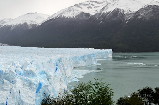 body of water near mountains in Perito Moreno Glacier Argentina
