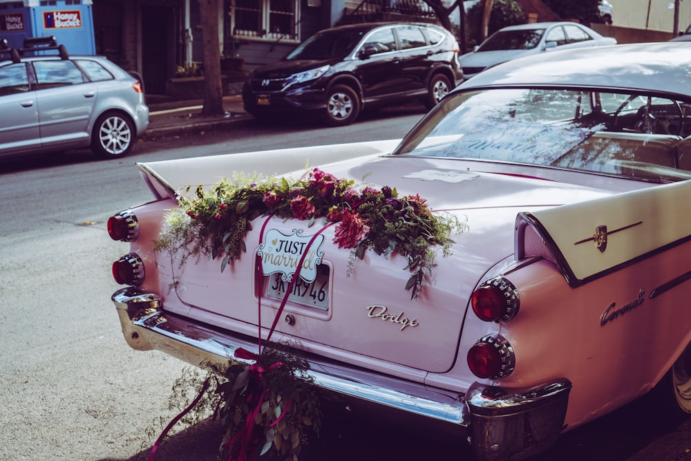 red flowers on white vehicle