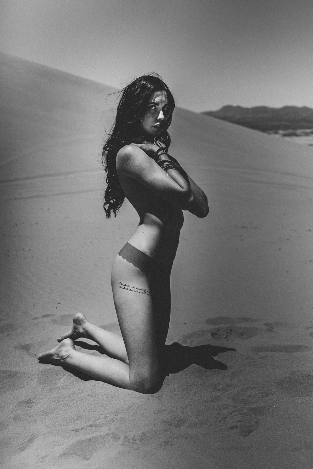 grayscale photo of woman in bikini