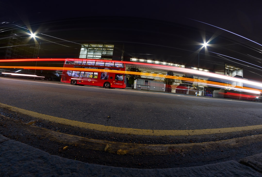 time lapse photography of bus at night