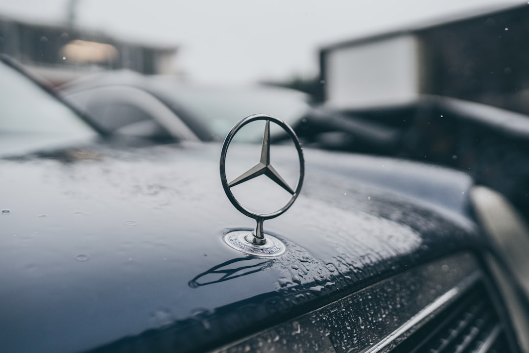 gray stainless steel Mercedes-Benz emblem
