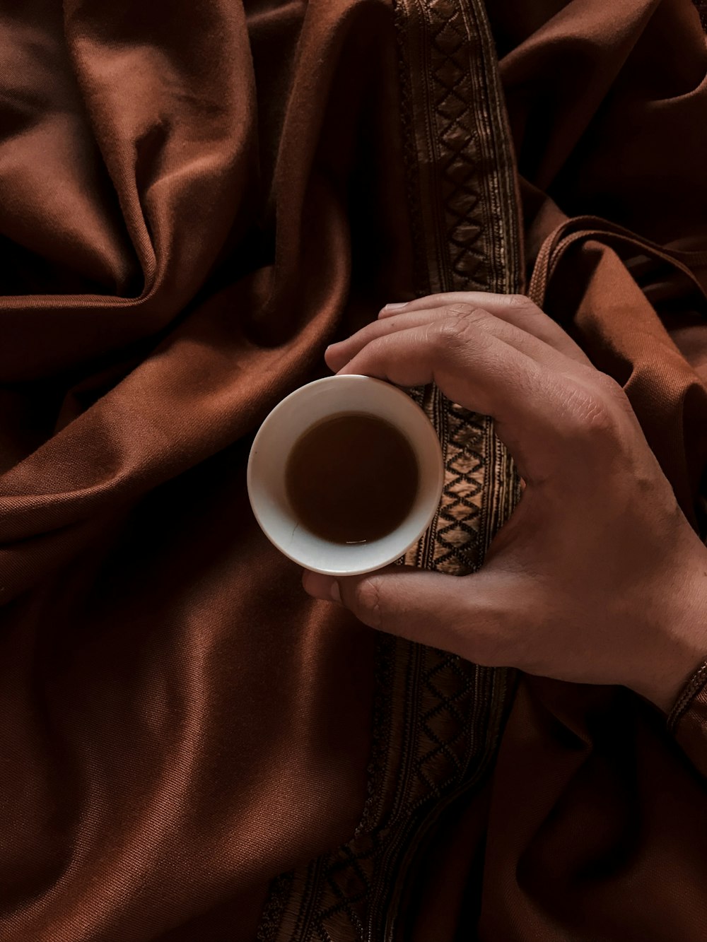 round white ceramic mug