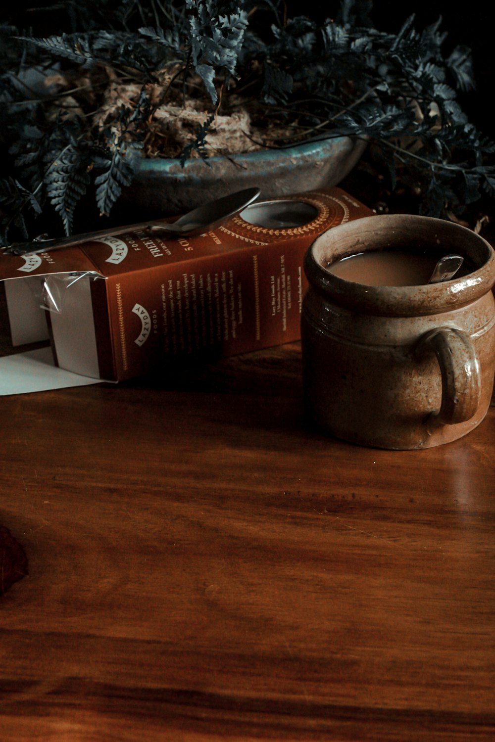 brown ceramic mug